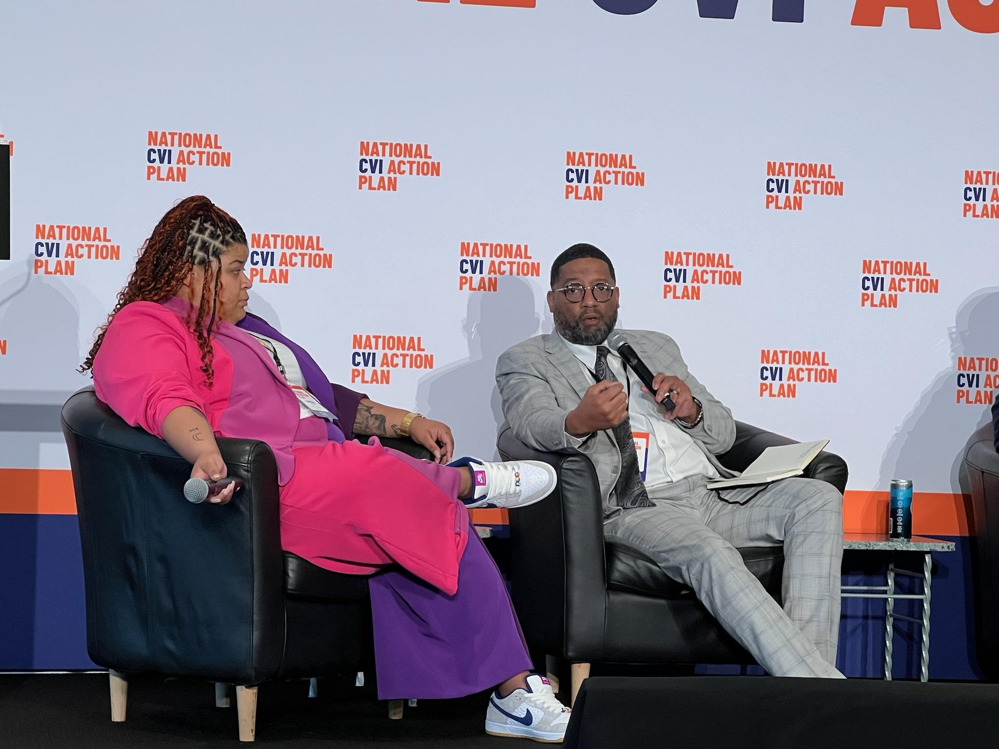 Jonathan McMillan speaking on a panel with other violence prevention leaders